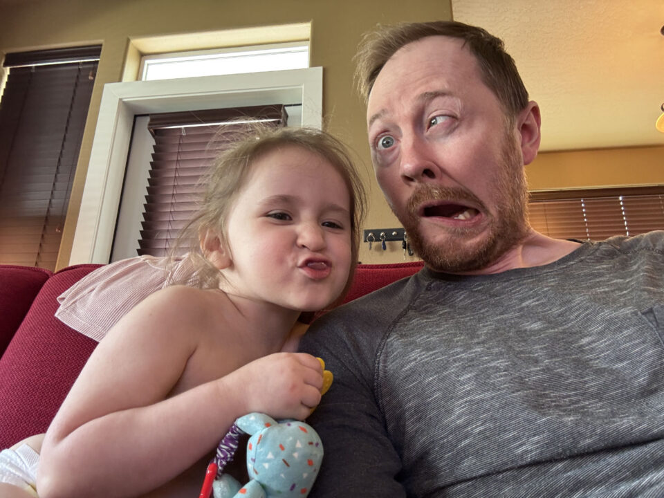 Olivia and daddy making faces