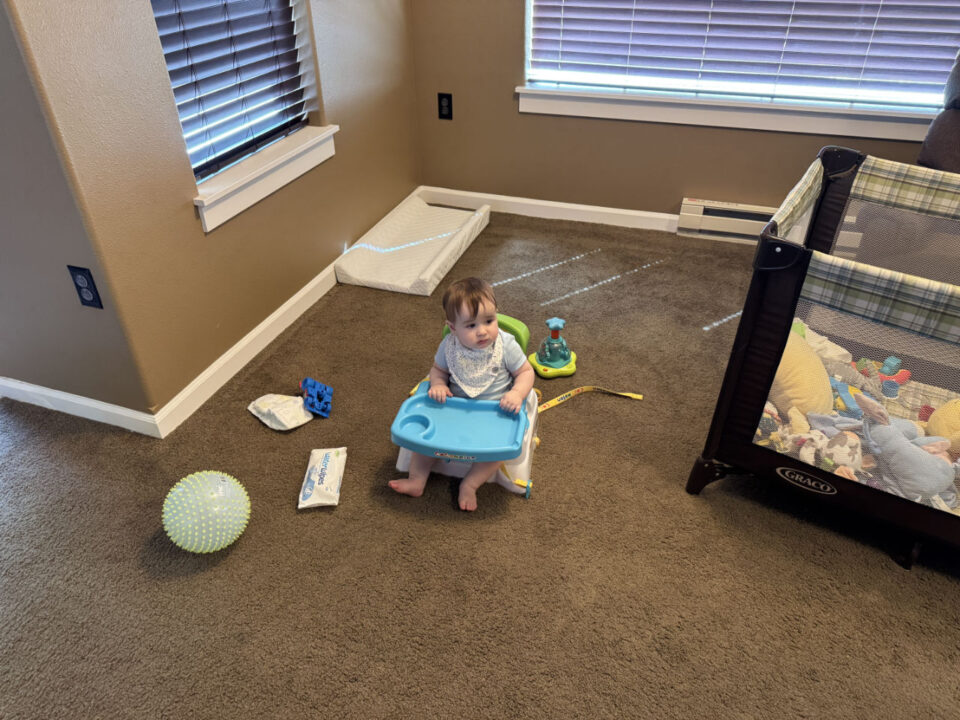 Jack in his booster chair