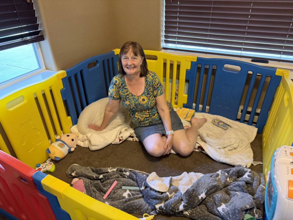 Cathy in Jack's playpen
