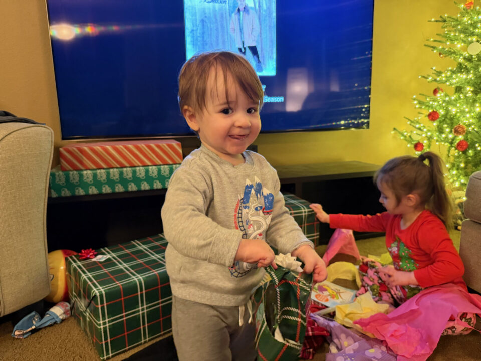Jack tearing open a Christmas present